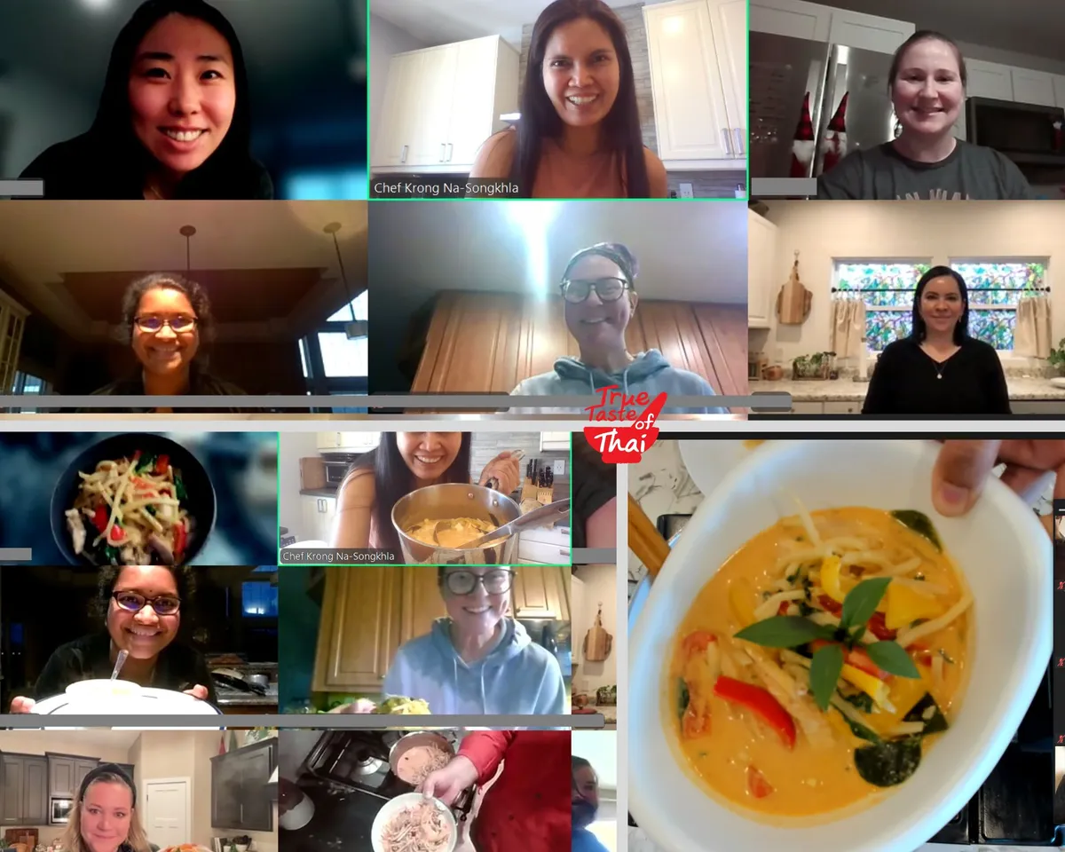 Participants smiling in a virtual Thai Red Curry cooking class, showcasing finished dishes and chef's guidance.